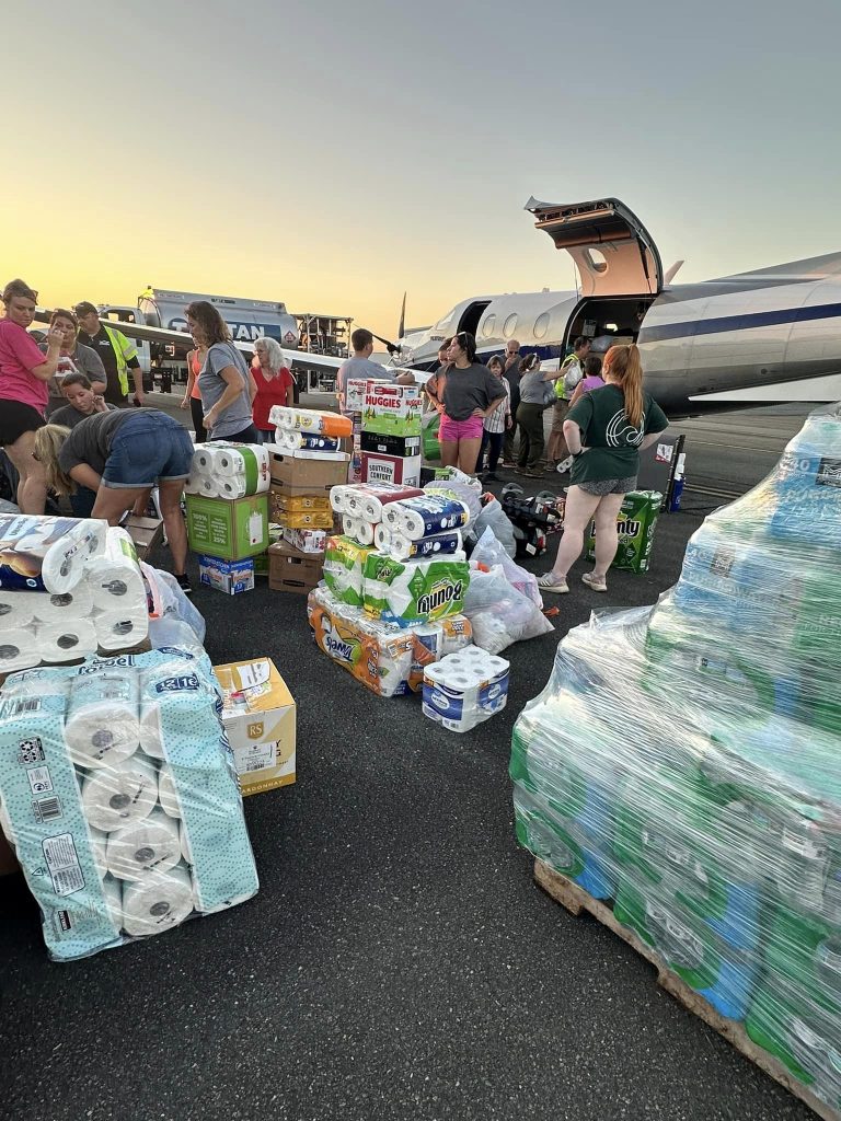 Supplies loaded into planes at Operation Airdrop.